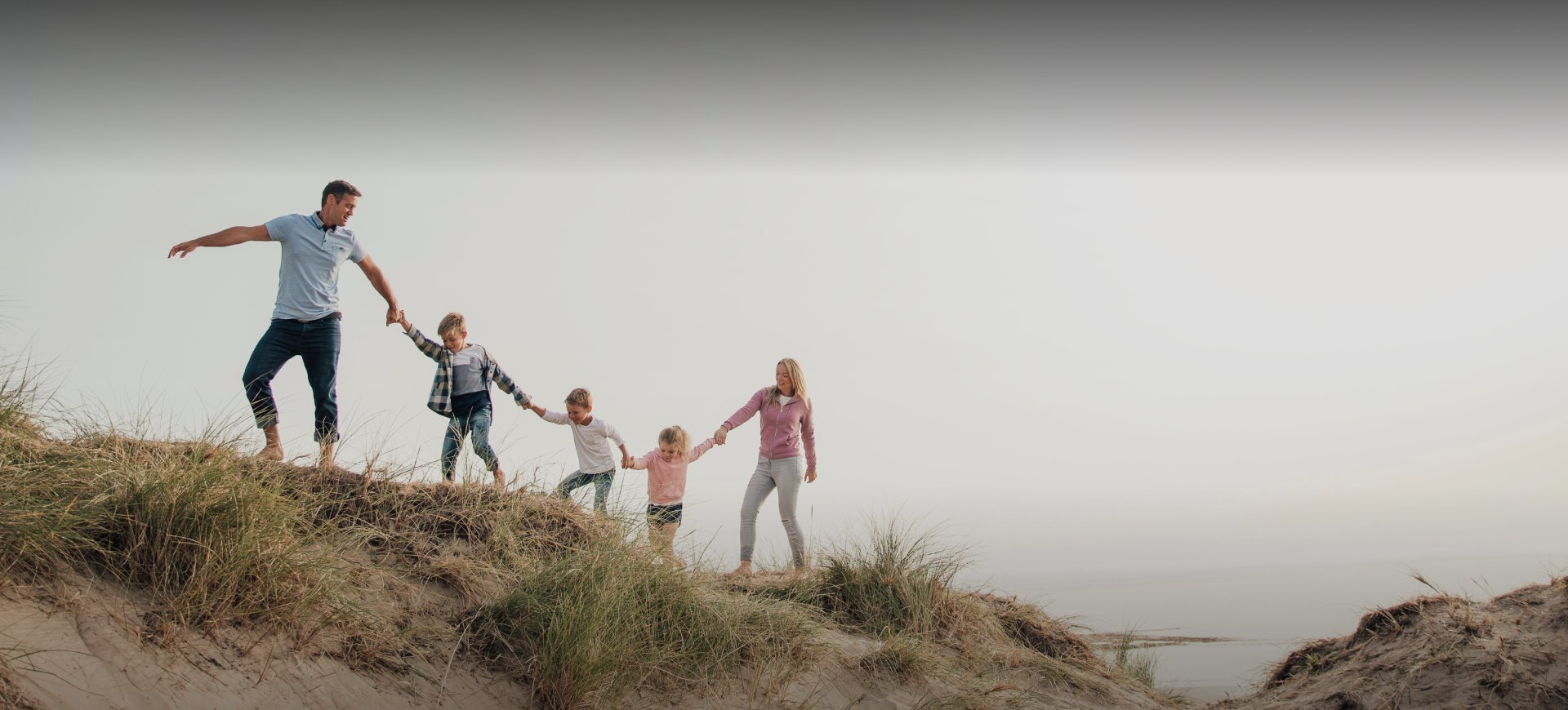 Family climbing a mountain